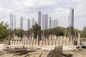 construction site, installation of iron foundations for concrete structures photo