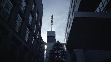 Exploring Urban Architecture Featuring Modern Design Elements Under Dramatic Natural Light video