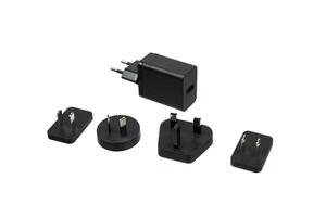 Universal travel adapter with multiple plug types, including European, UK, US, and Australian plugs, versatile for international use, isolated on a white back photo