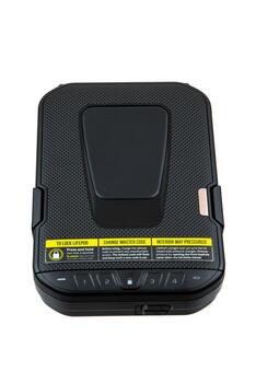 Compact black safe with a digital keypad and fingerprint scanner, suitable for securing valuables or firearms, isolated on a white back. photo