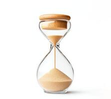 An elegant hourglass with a wooden top, symbolizing the passage of time and the importance of time management in daily life and productivity. photo