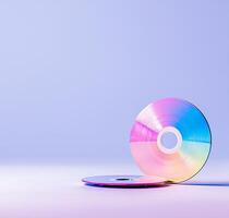 This vibrant image features colorful CDs placed against a soft purple background, symbolizing music, data storage, and the evolution of technology in our digital age. photo