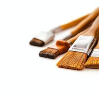 A collection of paintbrushes arranged neatly, showcasing different sizes and bristle types. Perfect for artists, hobbyists, and crafting enthusiasts seeking inspiration. photo