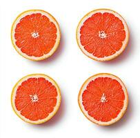 Freshly sliced grapefruit sections arranged in a symmetric pattern on a white background, showcasing their vibrant color and texture, perfect for healthy recipes and culinary inspi photo