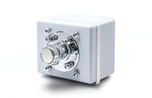 A modern, sleek electronic device featuring a metallic control knob and a minimalist white casing, ideal for various technological applications and commercial environments. photo