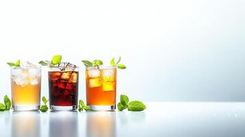 Three refreshing beverages with ice and mint leaves, displayed against a light backdrop. Perfect for summer or beverage advertisements, showcasing variety and freshness. photo