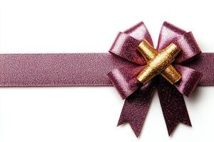 This image features a stunning, glittery gift bow in shades of purple with a golden accent, perfect for adding elegance to any present or celebration, symbolizing joy and festivity photo