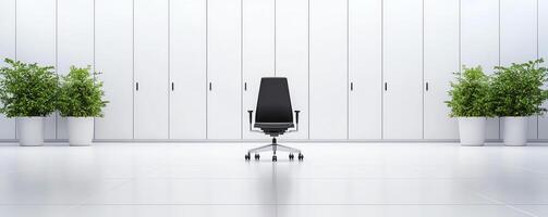 Modern office interior featuring a black ergonomic chair against a minimalist backdrop. Lush green plants add a touch of nature, creating a serene and productive workspace. photo