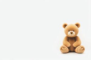 An adorable, soft teddy bear sits against a plain background, evoking feelings of nostalgia and comfort. Perfect for childhood themes, gifts, and emotional expressions. photo