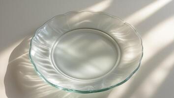 A glass plate with a shadow on it photo