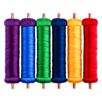 Colorful Spools of Thread Arranged in a Rainbow Pattern for Sewing Projects png