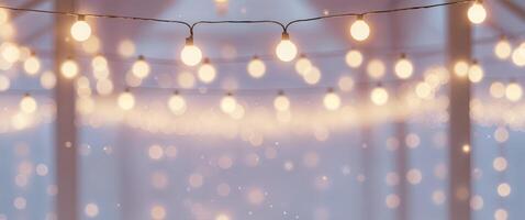 A string of lights hanging from a ceiling photo