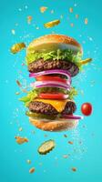 Mega hamburger captured mid-air with vibrant toppings and condiments floating around photo