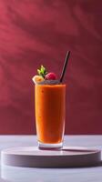 Thick and creamy turmeric smoothie garnished with fresh berries and mint on a stylish countertop photo