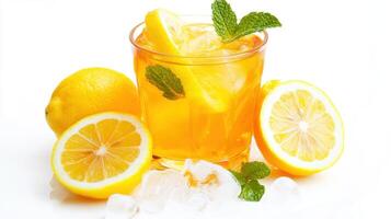 Refreshingly bright turmeric iced tea served with fresh lemon and mint for a delightful summer experience photo