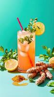 Refreshing lemonade infused with freshly grated turmeric and garnished with herbs and lemon slices for a vibrant summer drink photo