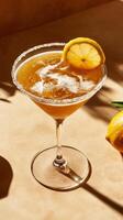 Lemon Drop Martini served with a lemon slice on a warm, textured background highlighting its refreshing nature photo