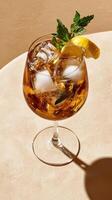Curved tabletop showcases a refreshing spritz garnished with mint and lemon photo