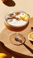 Refreshing cocktail elegantly served on a wooden board with citrus garnishes beside it at a stylish setting photo