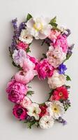 The number eight is made of flowers on a white background photo