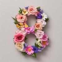 Number 8 made of flowers on gray background photo
