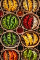 Vibrant assortment of colorful dumplings displayed in bamboo steamers with various dipping sauces photo