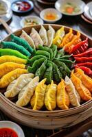 Vibrant assortment of colorful dumplings arranged in a basket ready for sharing and tasting at a festive gathering photo