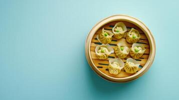 Bamboo steamer filled with delicious dumplings ready to be served at a cozy dining setting photo