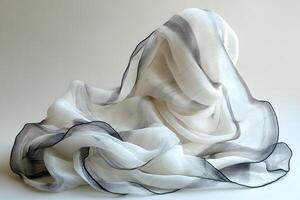 Elegant Flowing White and Gray Fabric with Gentle Curves for Design and Inspiration photo