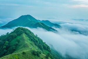 Majestic Mountaintop View Above a Sea of Clouds at Dawn photo