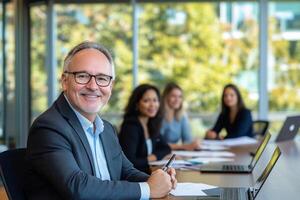 Businessman in meeting with colleagues photo