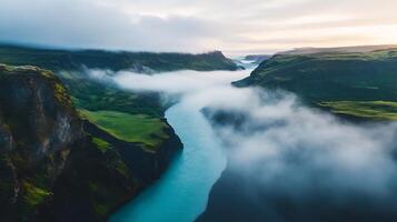 Misty river valley landscape at sunrise. photo