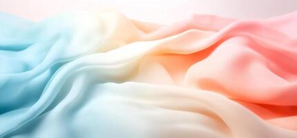 Pastel-colored fabric with soft folds and gradients. photo
