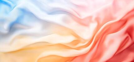 Abstract pastel fabric texture background with blue, orange, and red color gradient. photo
