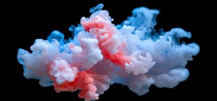 Abstract swirling blue, pink, and white ink in water. photo
