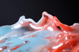 Abstract close-up of red and blue liquid splash. photo