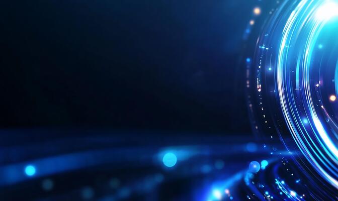 Abstract blue glowing light circles and particles.