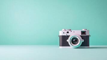 Retro camera on mint background. photo