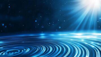 Abstract blue background with light rays and swirling patterns. photo