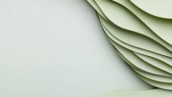 Abstract sage green layered paper waves on white background. photo