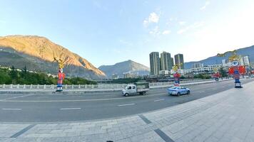 China, MaoXian, 01.01.2025 view of a city street with mountains in the background photo
