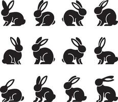 a set of black silhouettes of rabbits vector