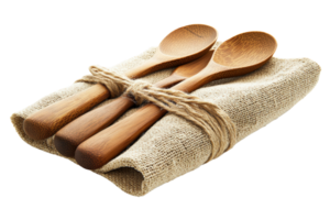 Wooden spoons tied with twine on burlap cloth in a rustic kitchen setting png
