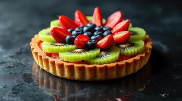 Vibrant fruit tart with golden crust and fresh kiwi slices on display photo