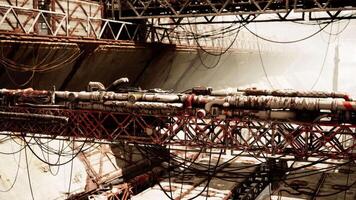 Old destroyed oil terminal with rusted pipelines and structural decay video