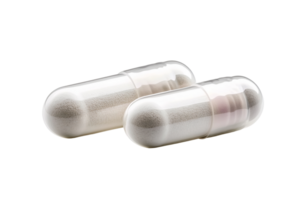 White capsules with powder fill isolated on transparent background png