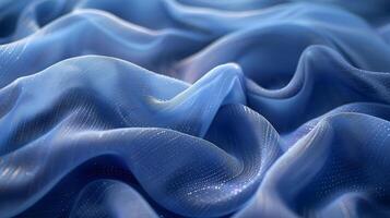 Abstract Background - Blue Fabric Waves with Shimmering Texture photo