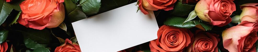 Ultra realistic close up of blank white card among vibrant red roses for romantic occasions photo