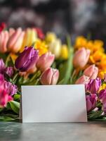 Elegant floral arrangement with blank card for personalized message or celebration photo