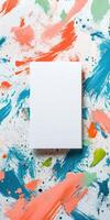 Delicate artistic flat lay of blank canvas with colorful brush strokes for creative design inspiration photo
